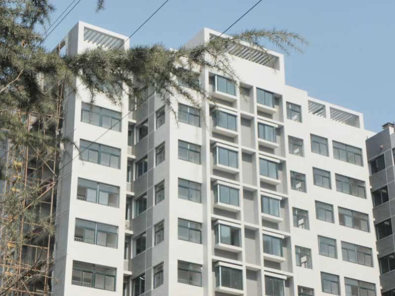 锦绣苑四期阳光里小高层楼体外立面施工中(20110308)